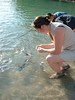 Lucy feeding the fish